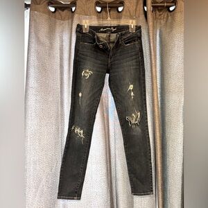 Ripped blue stretch skinny jeans